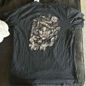 Black T-shirt never worn! Size large, tags still on, from cotton on!